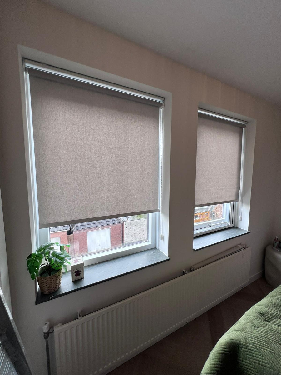 Rolgordijnen op maat in slaapkamer